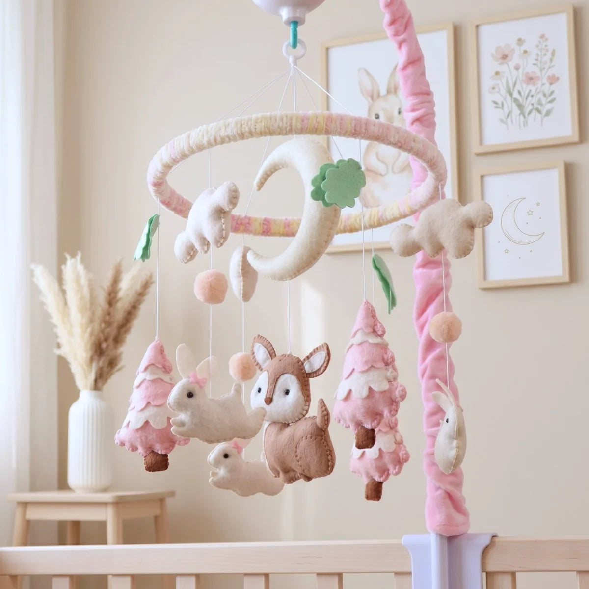 Pink Woodland Deer mobile styled in a nursery with blush, cream and sage tones