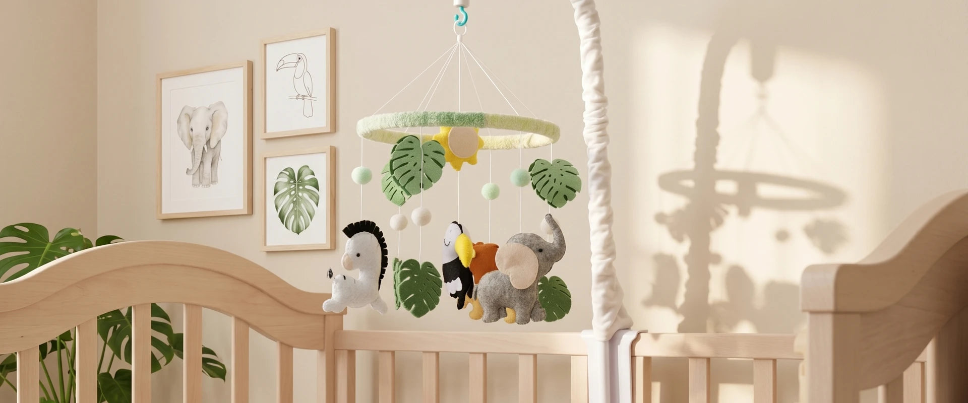 A Tinitigies nursery mobile for crib banner