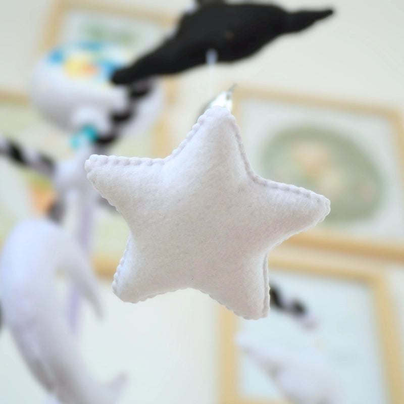 Soft felt star on Tinitigies black and white moon and star baby mobile for crib